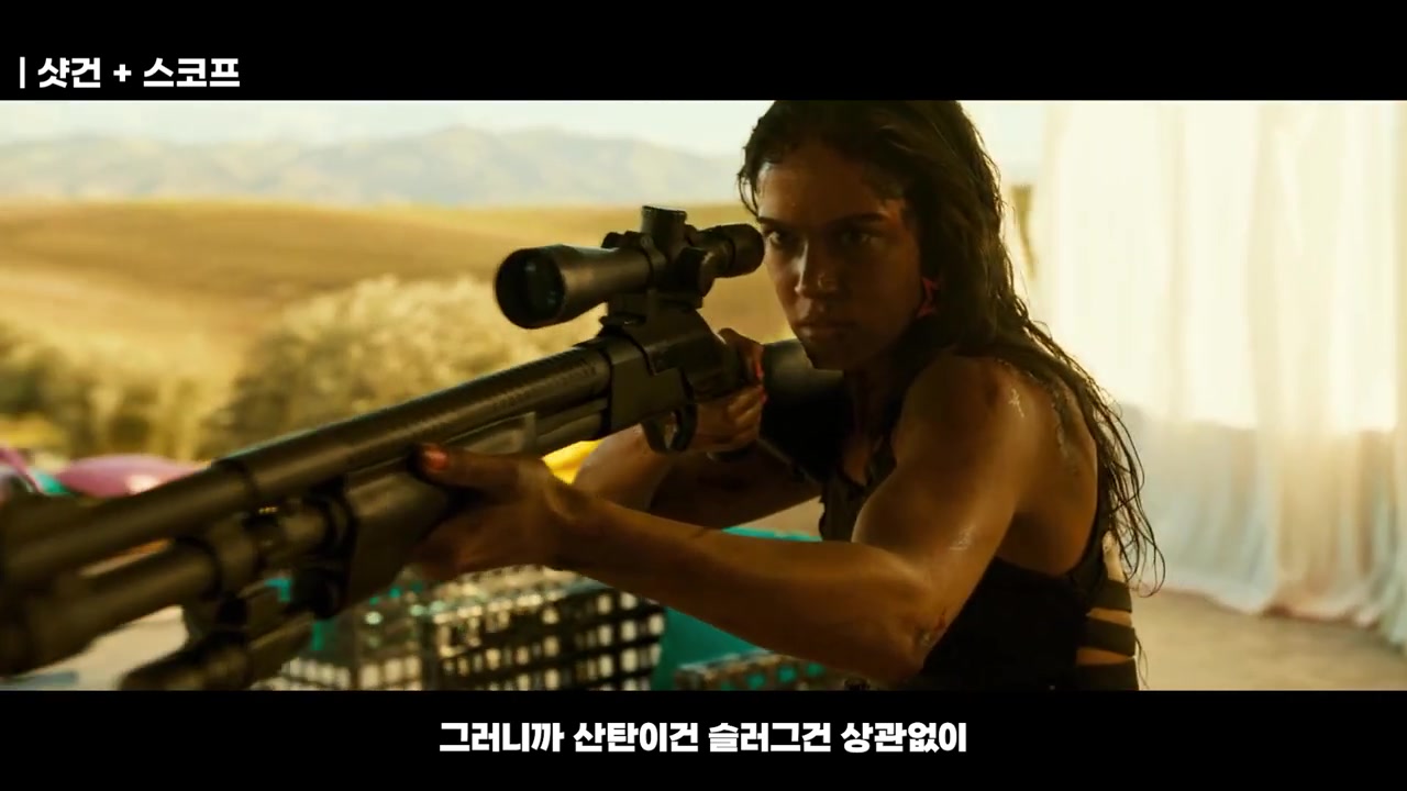 아놀드 슈워제네거가 데저트 이글을 겨누는 장면